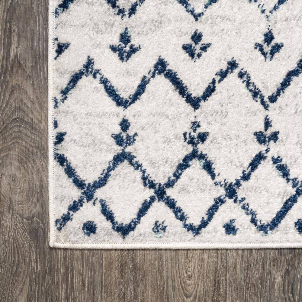 Ivory and Navy 4' x 6' Synthetic Trellis Area Rug