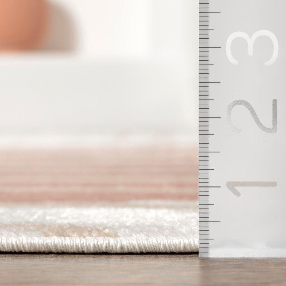 Blush and Ivory Abstract Synthetic 9' x 12' Area Rug