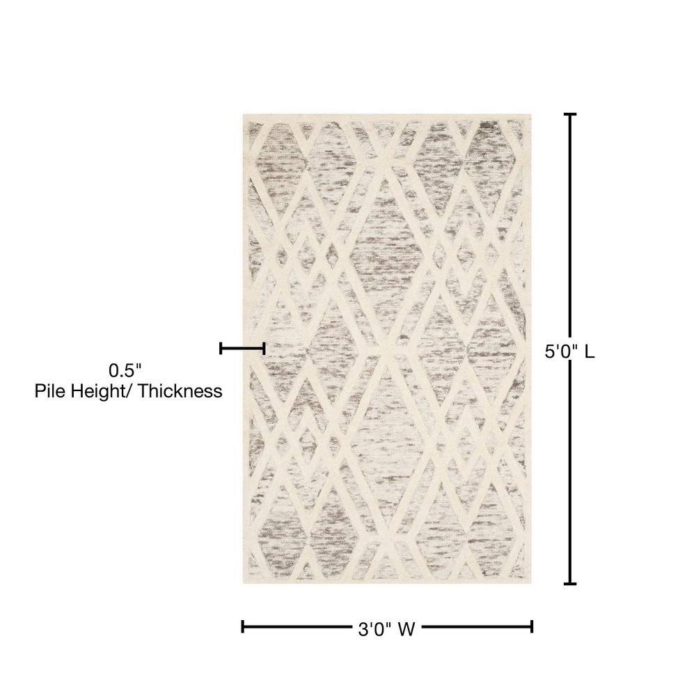 Hand-Tufted Wool Round Rug in Light Brown & Ivory, 3' x 5'