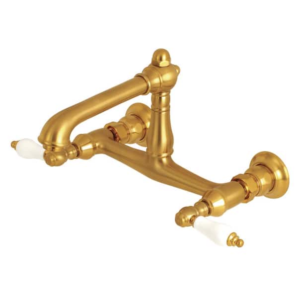 Kingston Brass English Country 2-Handle Wall Mount Bathroom Faucet in Brushed Brass