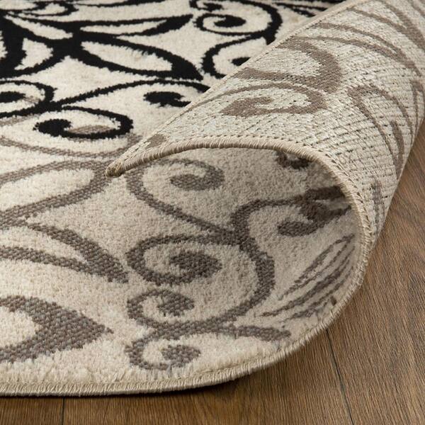 10 ft. Tan Gray and Black Floral Medallion Stain Resistant Runner Rug