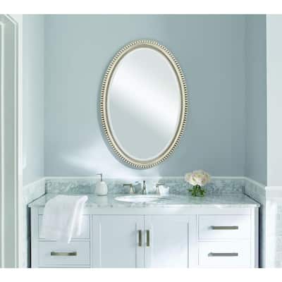 22 in. W x 32 in. H Framed Oval Bathroom Vanity Mirror in Champagne