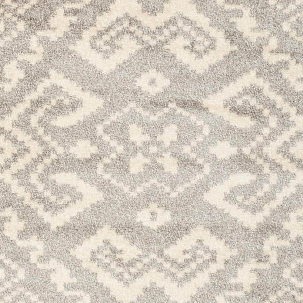 Chic Ivory & Silver Synthetic 10' x 14' Easy-Care Area Rug