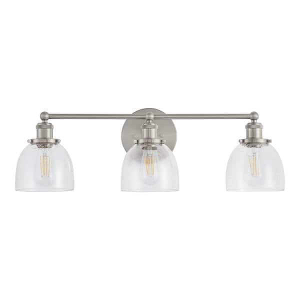 Evelyn 26.75 in. 3-Light Brushed Nickel Industrial Vanity with Clear Seedy Glass Shades