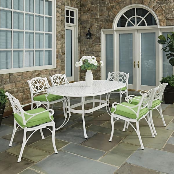 HOMESTYLES Sanibel White 7-Piece Cast Aluminum Oval Outdoor Dining Set with Green Cushions