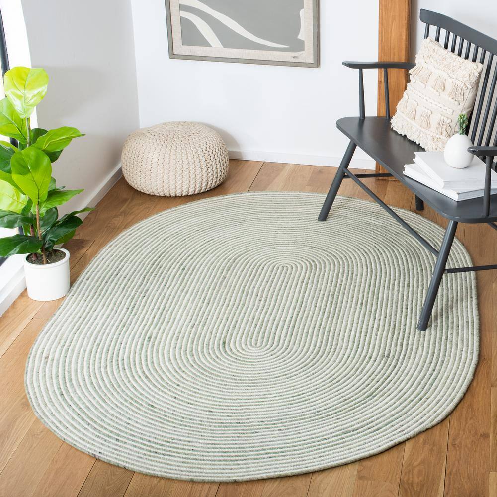 Ivory and Green Oval Braided Wool 4' x 6' Area Rug