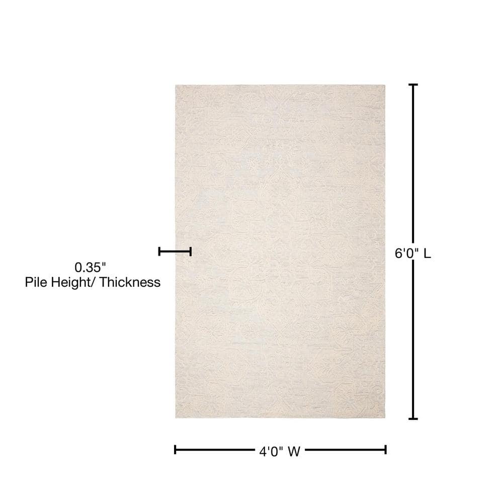 Ivory and Beige 4' x 6' Handmade Wool Abstract Tufted Rug