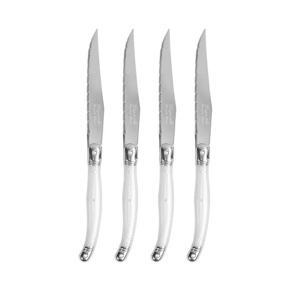 Laguiole steak knives. Slim white Corian handles with shiny