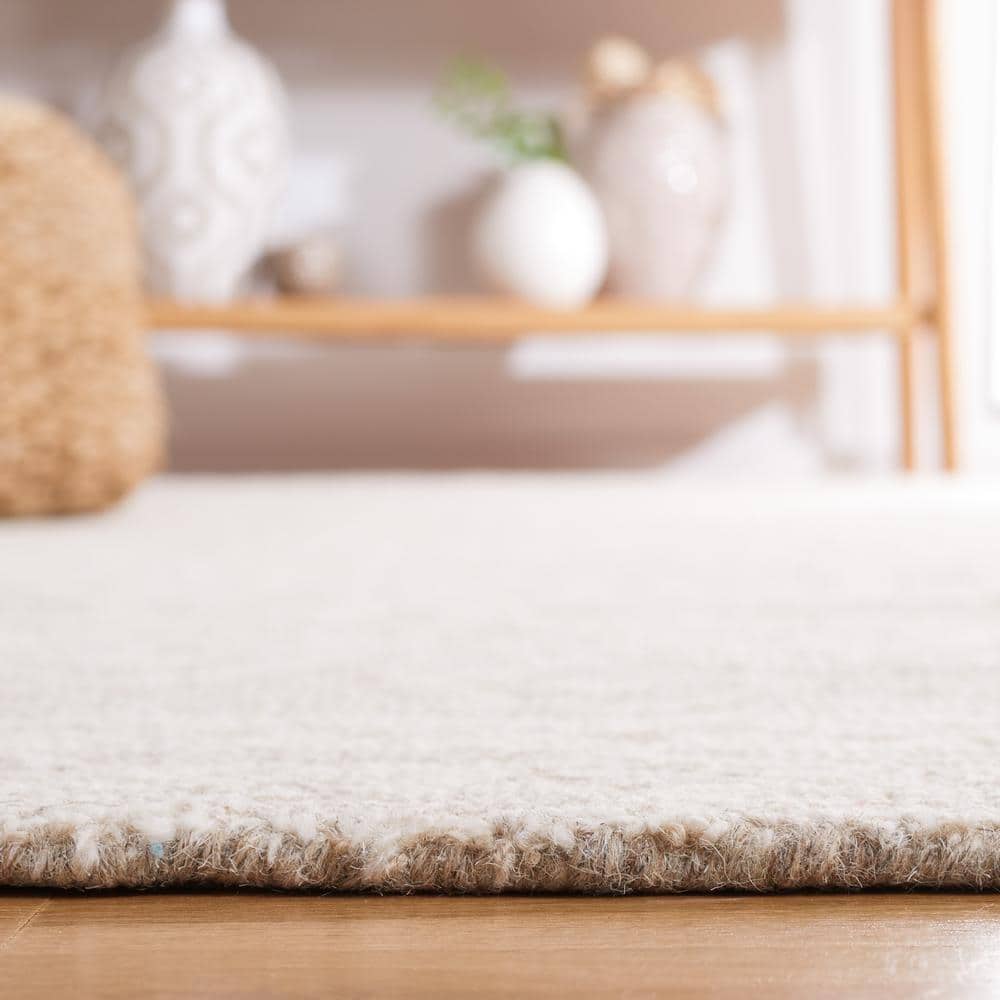 Hand-Tufted Beige/Ivory Woolen Soft Textured Area Rug - 2'6" x 4'