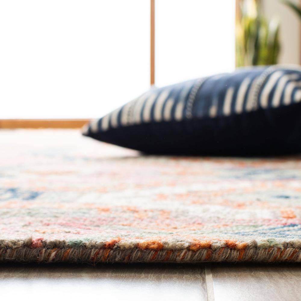 Handmade Blue and Orange Geometric Wool Area Rug