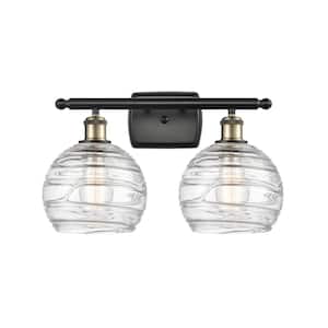Athens Deco Swirl 18 in. 2-Light Black Antique Brass Vanity Light with Clear Deco Swirl Glass Shade