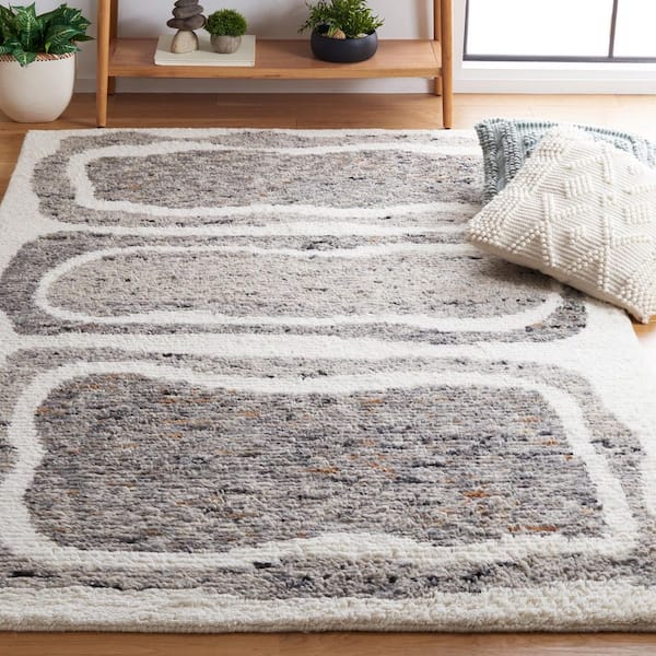 Casablanca 5 ft. x 8 ft. Ivory/Dark Gray Abstract Rectangle Area Rug