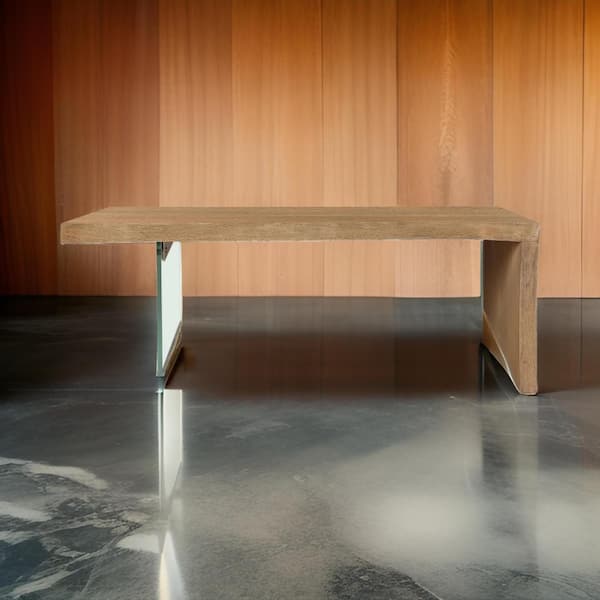 Benjara Uvi 54 in. Brown Rectangle Wood Coffee Table with Transparent Glass Leg and Waterfall Edge