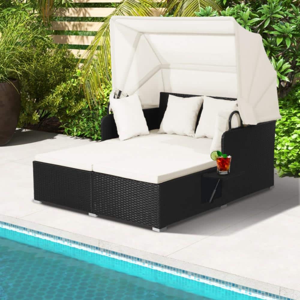 Black Wicker Outdoor Daybed with Off-White Cushions and Canopy