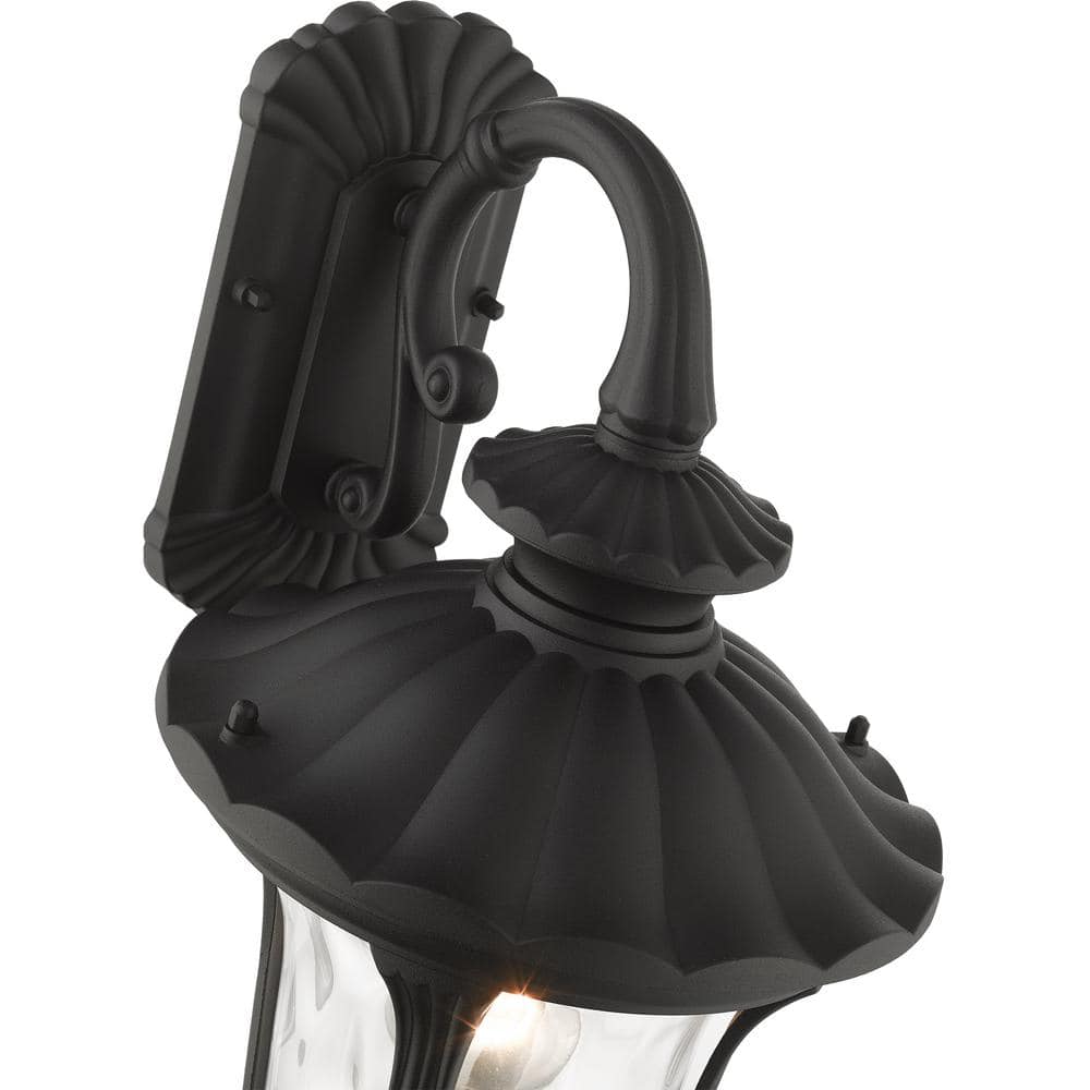 Black Textured Lantern Sconce with Clear Water Glass