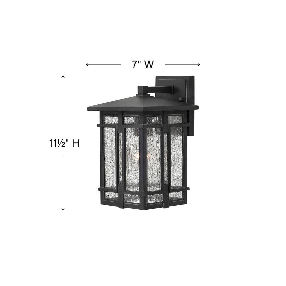 Tucker Museum Black Dimmable Outdoor Wall Sconce with Clear Seedy Glass