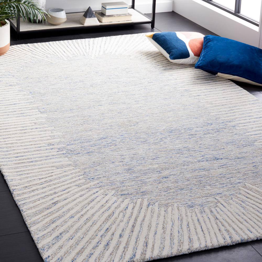 Handmade Blue and Ivory Abstract Wool 4' x 6' Rug