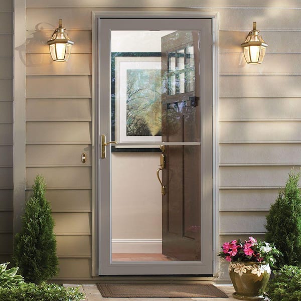 3000 Series 36 in. x 80 in. Sandtone Left-Hand Retractable Aluminum Storm Door with Brass Hardware