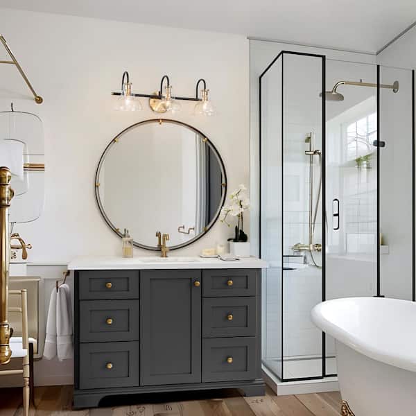 Saxifraga Modern 3-light Black and Brass Wall Sconce with Clear Dome Glass Shade, 22.5 in. Vanity Light for Bathroom