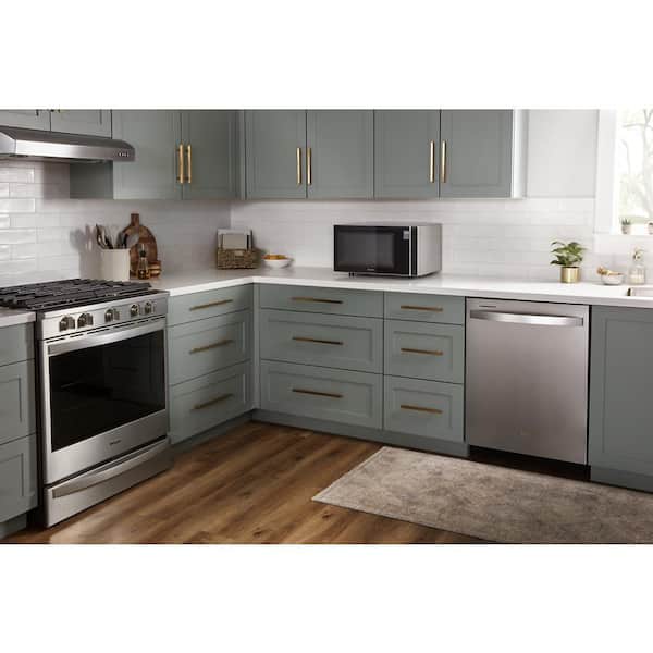 https://images.thdstatic.com/productImages/34729734-54db-4a07-9151-6000cc501676/svn/silver-whirlpool-countertop-microwaves-wmc30311ld-31_600.jpg
