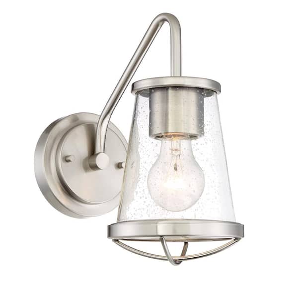 Designers Fountain Darby 5.75 in. 1-Light Satin Platinum Industrial Wall Sconce with Clear Seeded Glass Shade