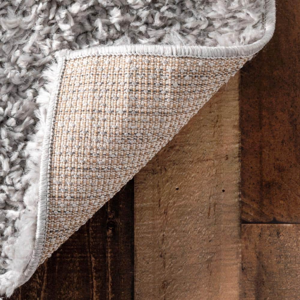 Gray Synthetic Solid Shag Area Rug 5' 3" x 7' 7"