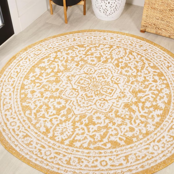 https://images.thdstatic.com/productImages/34a15f66-f209-407b-90fa-d5aa9ea9e447/svn/yellow-cream-jonathan-y-outdoor-rugs-smb101i-5r-64_600.jpg