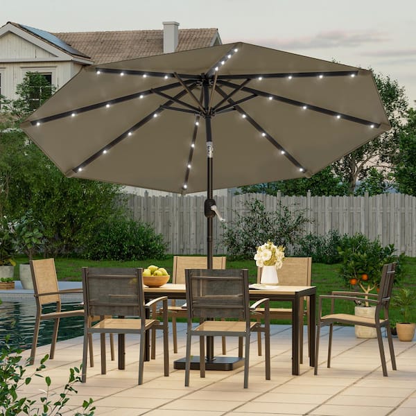 9 foot patio umbrella with solar lights JOYESERY 9 ft. Solar LED Market Patio Umbrellas with Solar Lights and Tilt  Button in Taupe J-UM-098K-LED