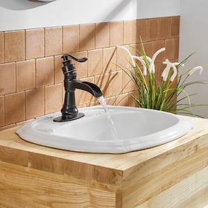 Waterfall Single Hole Single-Handle Low-Arc Bathroom Faucet With Pop-up Drain Assembly in Oil Rubbed Bronze