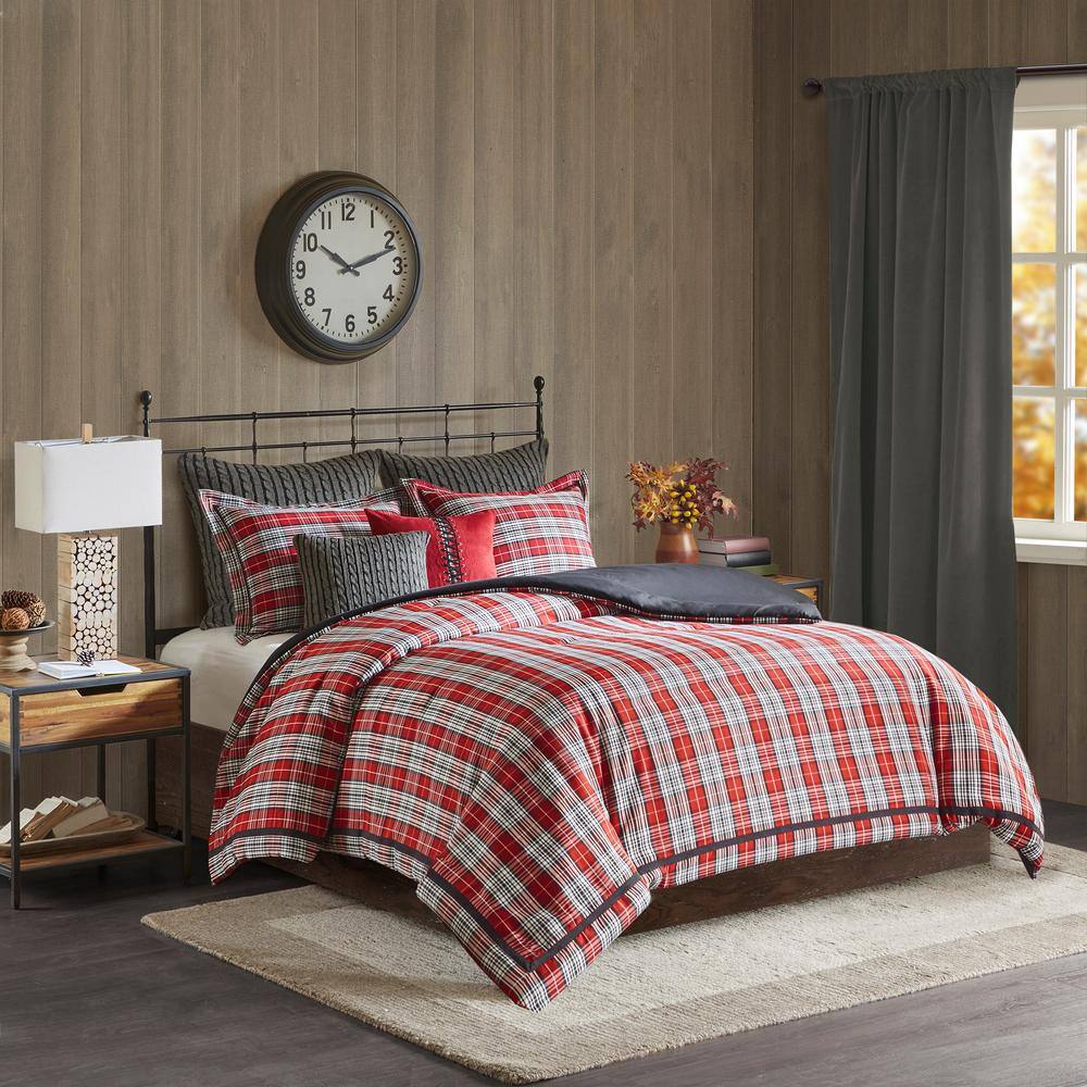 Woolrich Williamsport 4-Piece Red Queen Comforter Set The Williamsport Plaid collection brings a bold classic plaid to life in this updated red, black, and white combination. The comforter and shams are a beautiful jacquard woven plaid accented with black faux suede, giving you a true sense of warmth and coziness. Decorative pillows are available to complement the bedding set (sold separately).