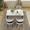 Top-down view of the Magic Home sintered stone dining table with four chairs.