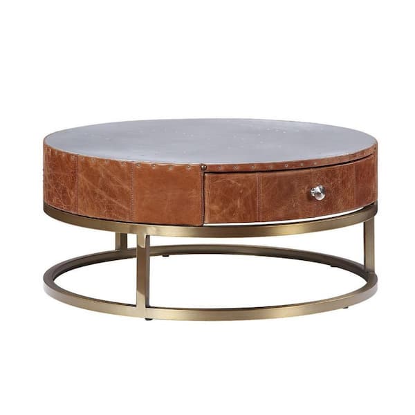 HomeRoots Mariana 32 in. Aluminum & Cocoa Top Grain Leather Round Metal Coffee Table with Drawers, and Storage