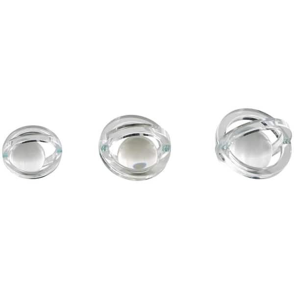 Litton Lane Mavern Clear 4 in. x 5 in. Glass Orb Geometric Sculpture with Overlapping Rings and Ball Center (Set of 3)