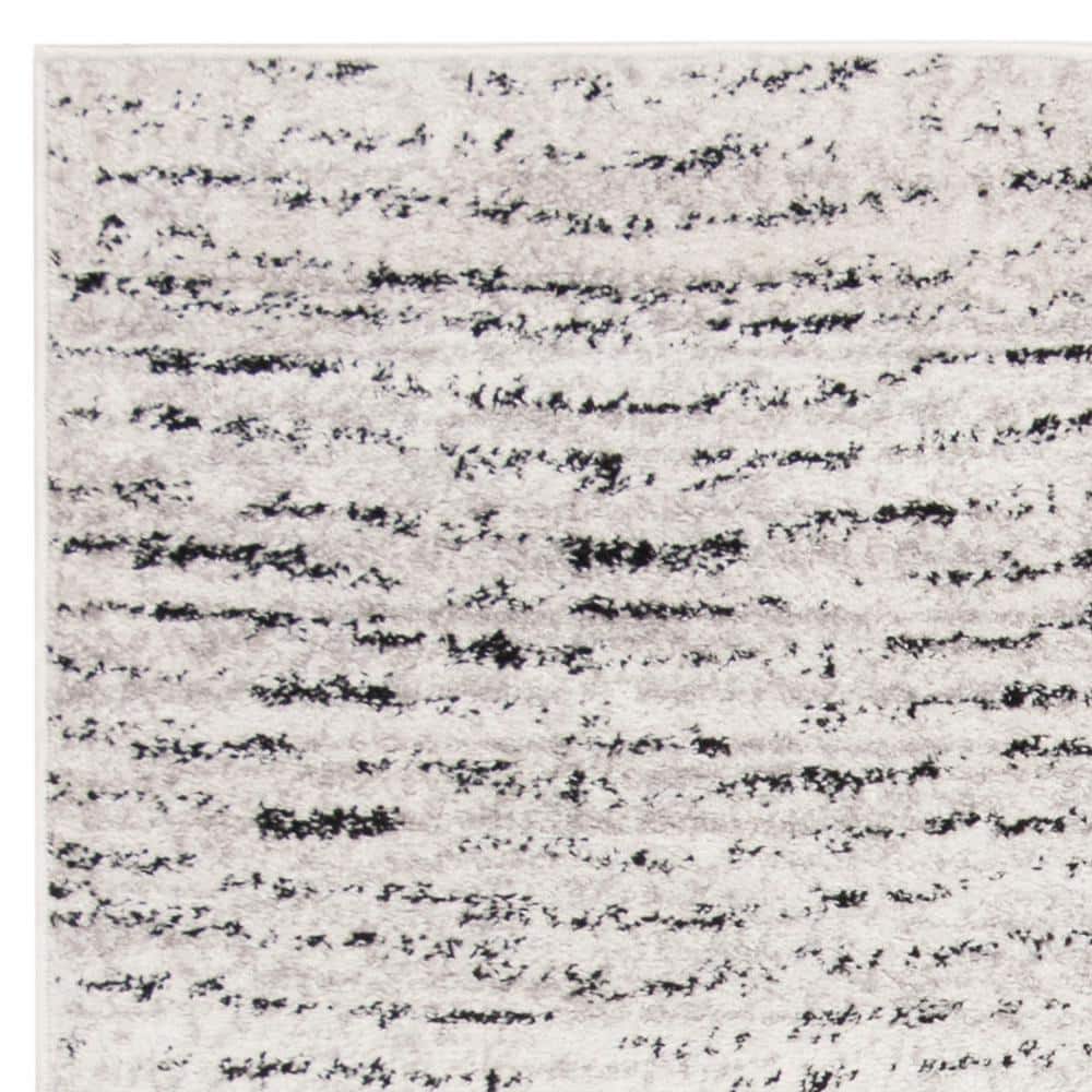 Ivory and Silver Synthetic Rectangle Area Rug, 10' x 14'