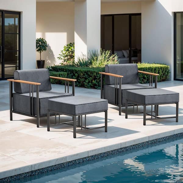 Puffin 4-Piece Black Metal Outdoor Lounge Chairs with 10 in. Olefin Dark Gray Cushions and Ottomans