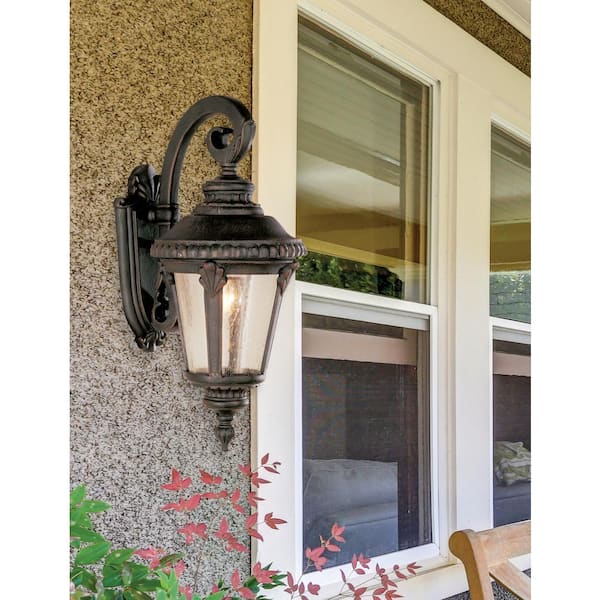 Commons 1-Light Rust Lantern Outdoor Wall Light Fixture with Seeded Glass
