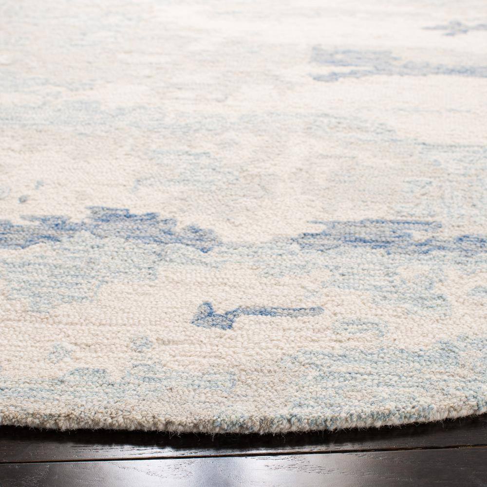 Ivory and Blue Round Hand-Tufted Wool Abstract Rug