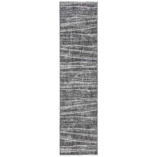 SAFAVIEH Courtyard Black/Ivory 2 ft. x 9 ft. Abstract Striped Indoor/Outdoor Patio  Runner Rug