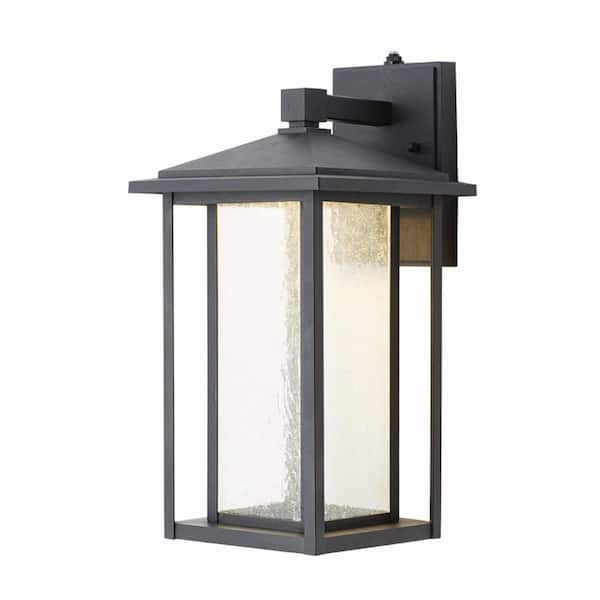 Home Decorators Collection - Mauvo Canyon 15.5 in. Black Dusk to Dawn LED Outdoor Wall Light Fixture Porch Sconce with Seeded Glass