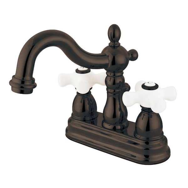 Kingston Brass Heritage 4 in. Centerset 2-Handle Bathroom Faucet with Brass Pop-Up in Oil Rubbed Bronze