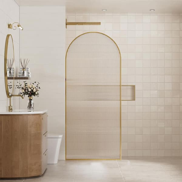 34in W x 78in H Framed Fixed Curved Design Shower Screen Door in Brushed Gold with 3/8 in. Fluted Glass