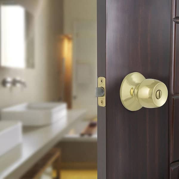 Defiant Saturn Polished Brass Bed/Bath Privacy Door Knob