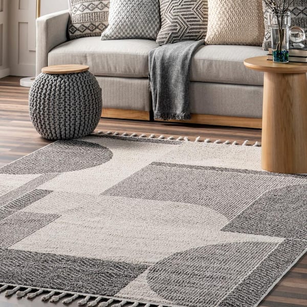 https://images.thdstatic.com/productImages/359eae0e-7d86-5061-a287-e497e541880a/svn/light-gray-nuloom-area-rugs-rzet02a-8010-4f_600.jpg