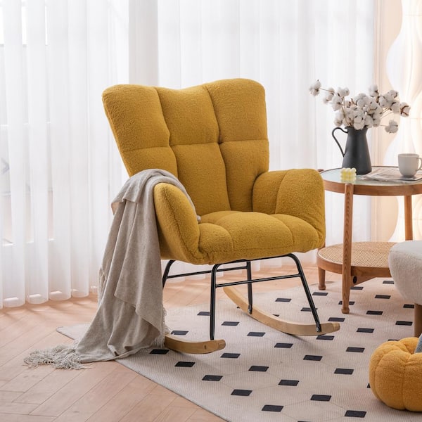 yellow upholstered rocking chair