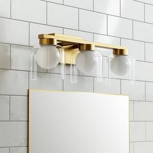 Austin 20.5 in. 3-Light Classic Brass Integrated LED Adjustable 3 CCT Vanity Light with White and Clear Glass Shade