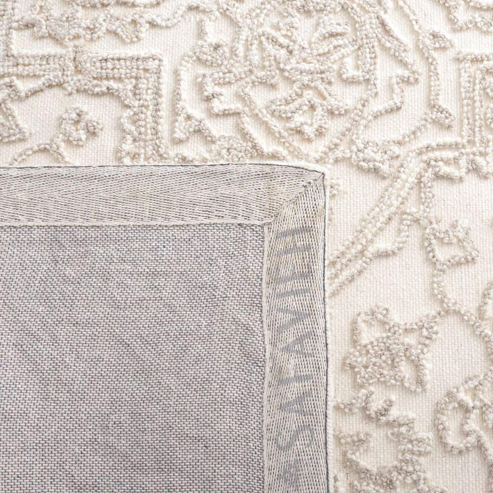 Ivory and Natural 4' x 6' Hand Tufted Wool Area Rug