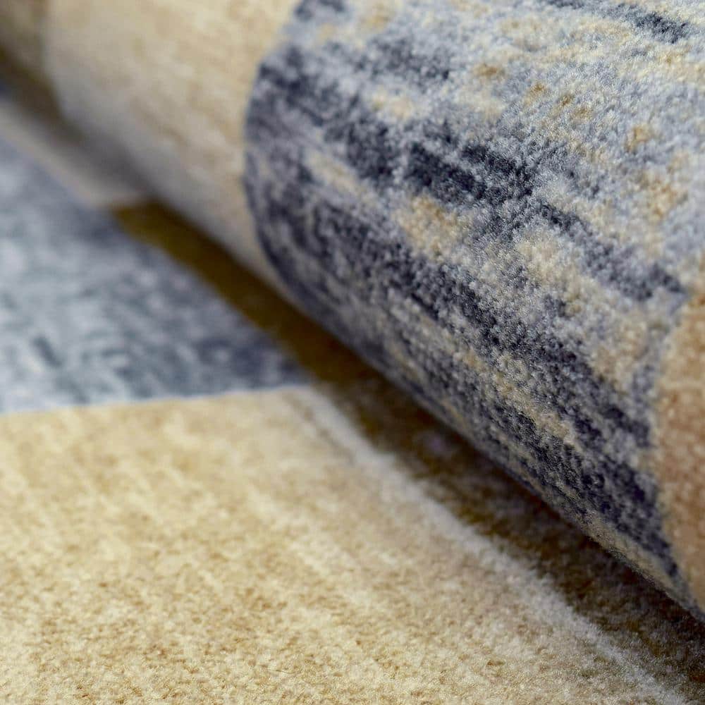 Cream 9' x 12' Non-Slip Synthetic Area Rug