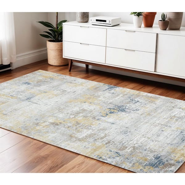 4 ft. x 6 ft. Gold Ivory And Blue Abstract Area Rug