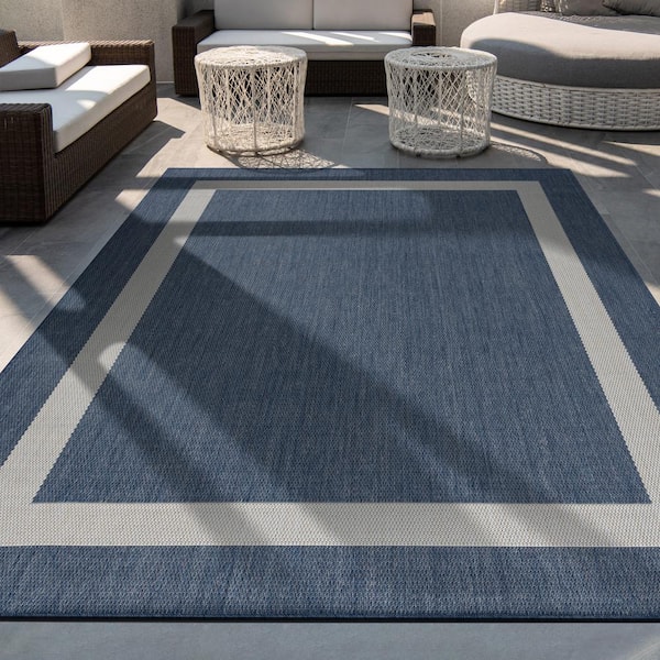 https://images.thdstatic.com/productImages/35ec76ba-8013-41d3-b554-2b9a95325442/svn/blue-white-camilson-outdoor-rugs-out403-6x9-hd-4f_600.jpg