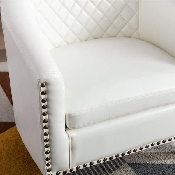 white leather chair with nailheads